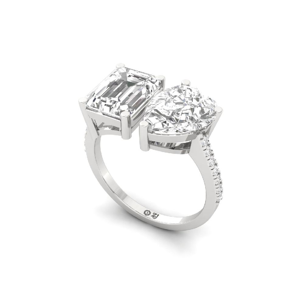 two Diamonds Emerald & Pear Cut Bypass Diamond Ring