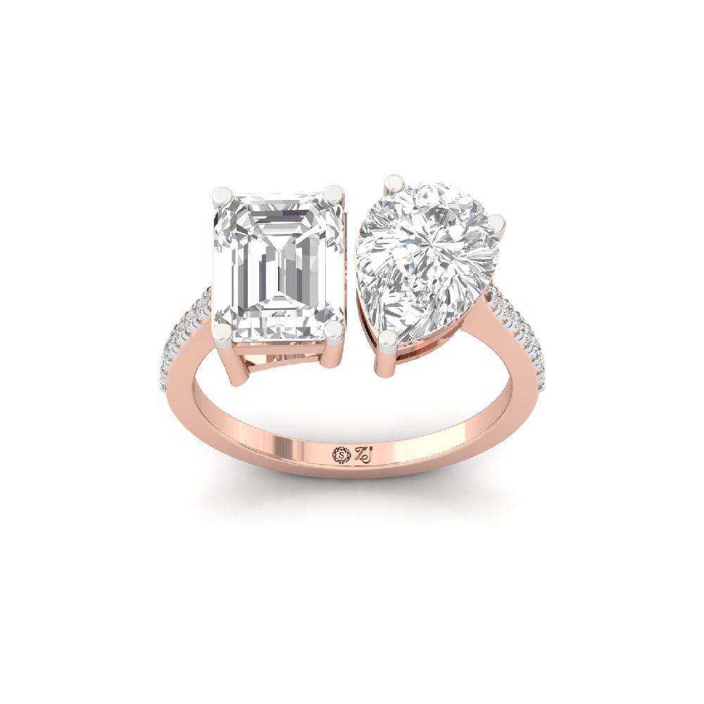 two Diamonds Emerald & Pear Cut Bypass Diamond Ring